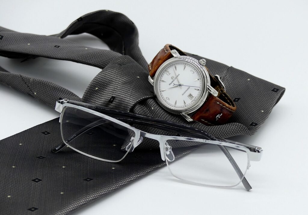wrist watch, clock, necktie, reading glasses, men's watch, man, men's accessory, neck tie, glasses, fashion, design, modern, classic, fashionable, fancy, elegant, fashion conscious, timepiece, accessories, wrist watch, accessories, accessories, accessories, accessories, accessories